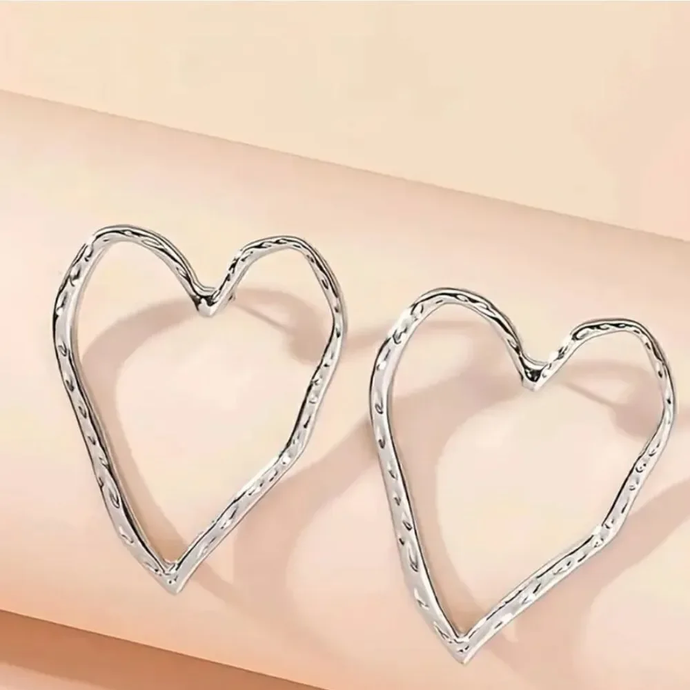 Heart silvertone stud earrings